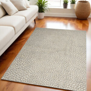 5' X 7' Beige and Gray Animal Print Power Loom Area Rug