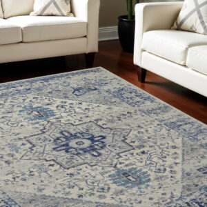 7' X 10' Ivory And Light Blue Floral Medallion Distressed Area Rug