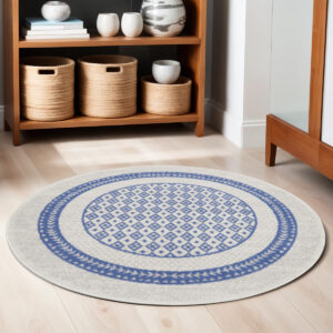 5' Ivory and Blue Geometric Distressed Round Rug