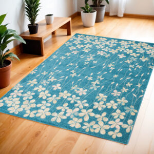 4' X 6' Turquoise and Cream Botanical Leaves Area Rug