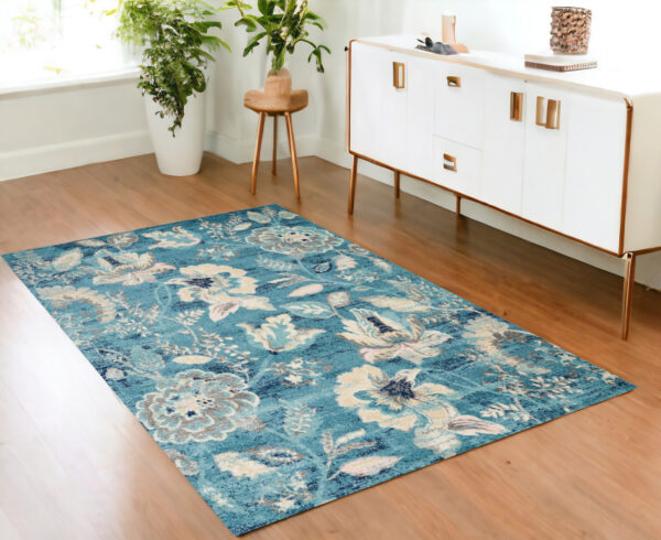 4' X 6' Turquoise Cream and Navy Blue Floral Distressed Area Rug