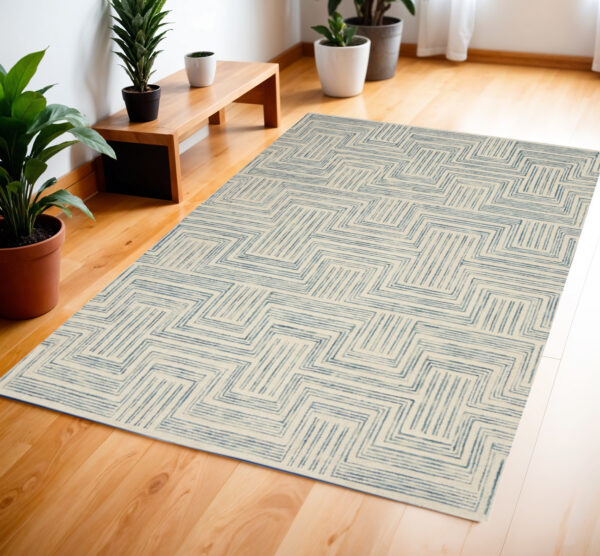 4' X 6' Ivory And Turquoise Wool Geometric Area Rug