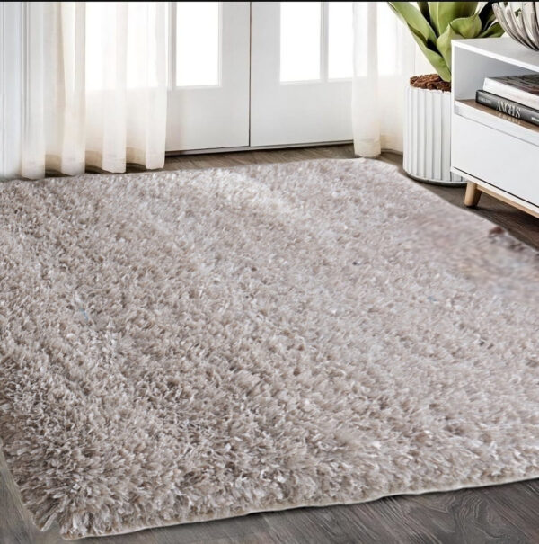 8' X 11' Beige Shag Hand Tufted Area Rug