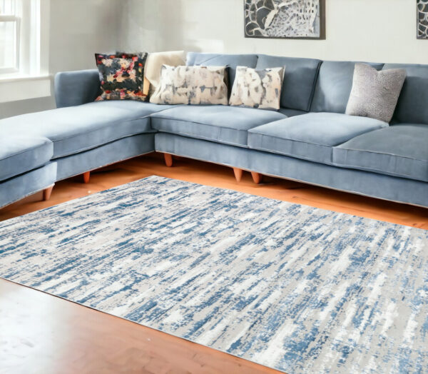 10' Blue And Ivory Abstract Washable Runner Rug