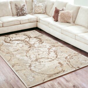 5' X 8' Beige and Gold Abstract Area Rug