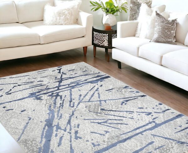 5' X 8' Ivory and Blue Abstract Area Rug