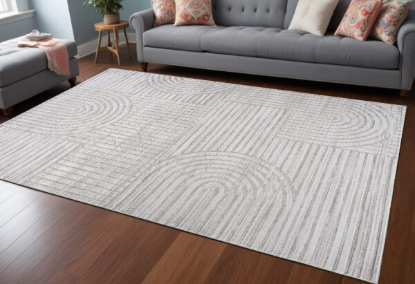 7' X 10' Gray and Ivory Abstract Distressed Area Rug