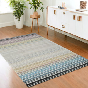 4' X 6' Beige and Blue Abstract Distressed Area Rug