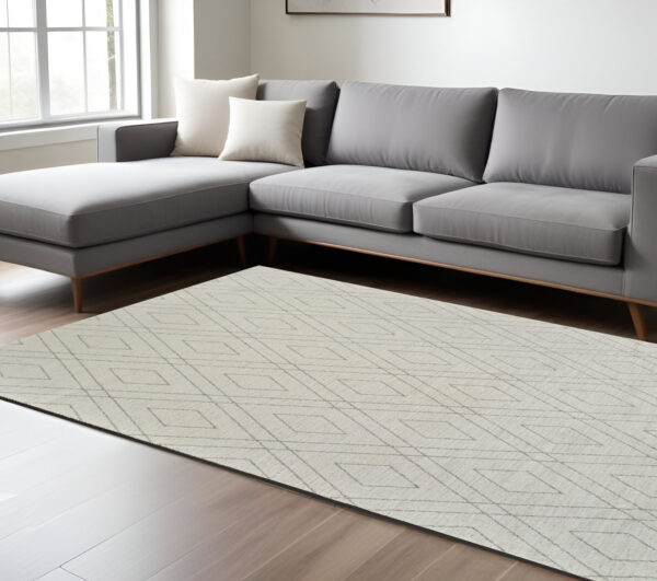 7' X 10' Beige and Gray Abstract Non Skid Area Rug