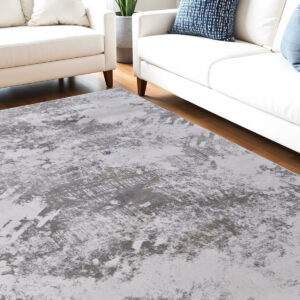 5' X 8' Gray and Silver Abstract Power Loom Worn Faded Area Rug