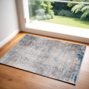 3' X 5' Ivory Gray and Blue Abstract Power Loom Area Rug With Fringe