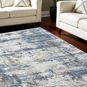 7' X 10' Ivory Tan and Blue Abstract Power Loom Area Rug With Fringe