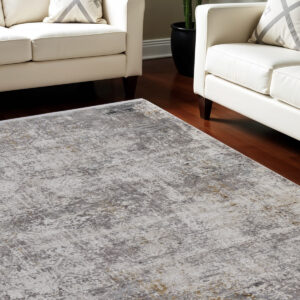 8' X 11' Ivory Taupe and Gray Abstract Power Loom Distressed Area Rug With Fringe