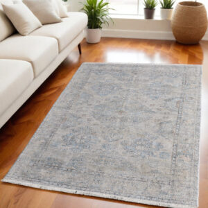 5' X 8' Gray Blue and Taupe Oriental Hand Woven Distressed Area Rug With Fringe
