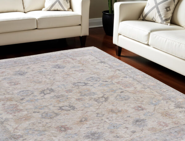 10' X 14' Ivory Tan and Blue Floral Hand Woven Distressed Area Rug With Fringe