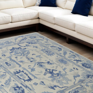 9' X 13' Ivory and Blue Wool Floral Hand Knotted Area Rug With Fringe