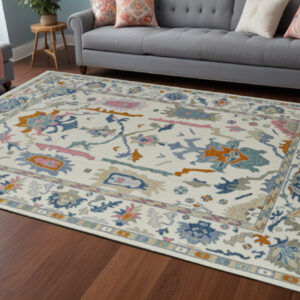 8' X 12' Blue Ivory and Pink Wool Floral Hand Knotted Area Rug With Fringe