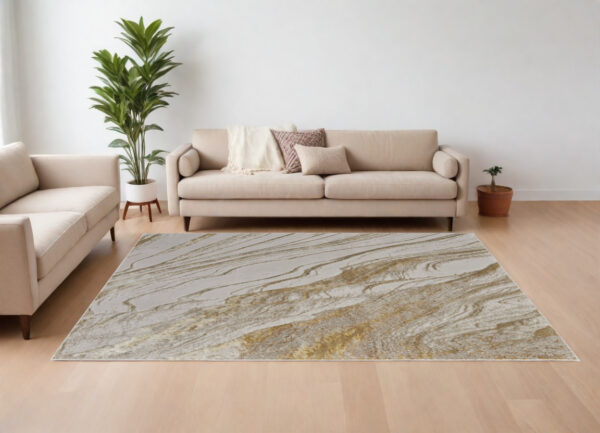 7' X 10' Ivory Brown and Gold Abstract Power Loom Area Rug