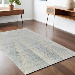 4' X 6' Ivory and Blue Abstract Hand Knotted Worn Faded Area Rug