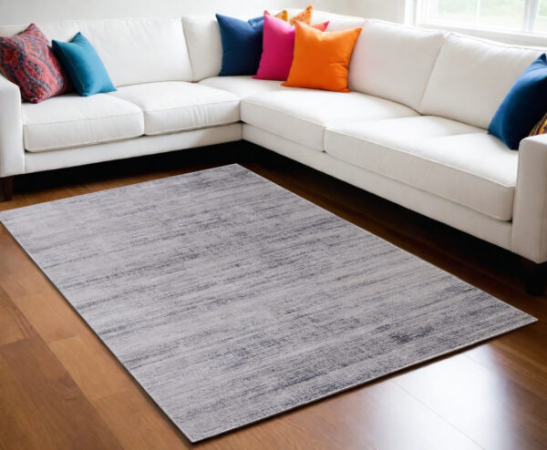 5' X 8' Gray and Ivory Power Loom Area Rug