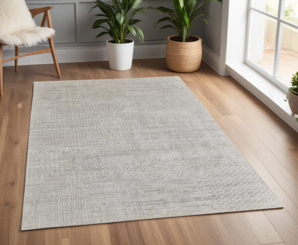 4' X 6' Ivory and Gray Abstract Hand Woven Worn Faded Area Rug