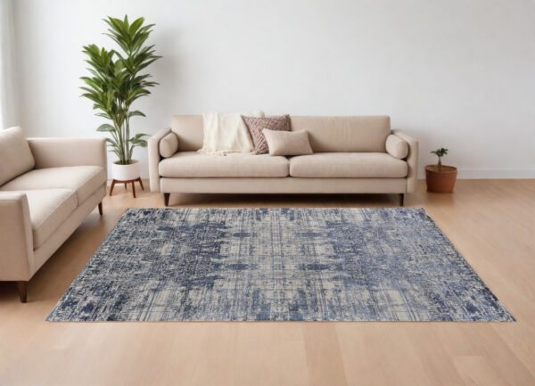 8' X 10' Blue and Ivory Abstract Hand Woven Worn Faded Area Rug