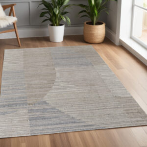 4' X 6' Tan and Blue Abstract Hand Woven Worn Faded Area Rug