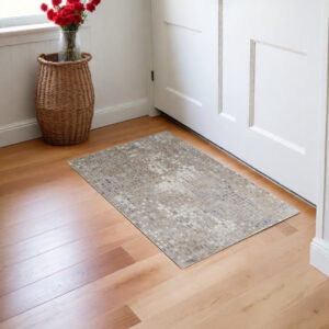 3' X 5' Tan Ivory and Blue Geometric Power Loom Worn Faded Area Rug