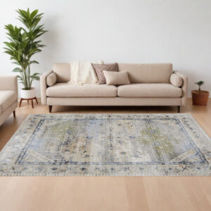 7' X 10' Ivory Green and Blue Abstract Power Loom Worn Faded Area Rug