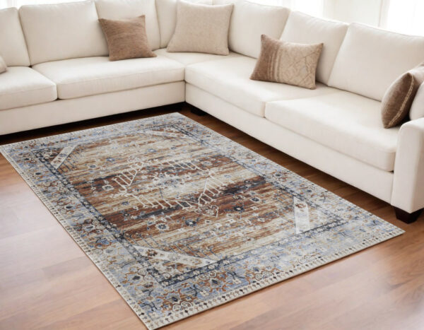 5' X 8' Ivory Red and Blue Abstract Power Loom Worn Faded Area Rug
