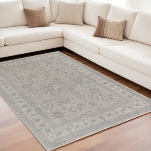 5' X 7' Silver Taupe and Blue Oriental Power Loom Worn Faded Area Rug With Fringe