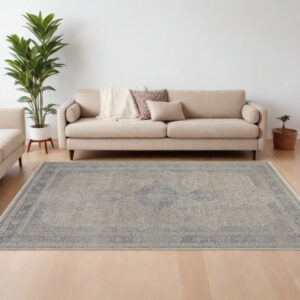 9' X 13' Gray Blue and Taupe Oriental Power Loom Worn Faded Area Rug With Fringe