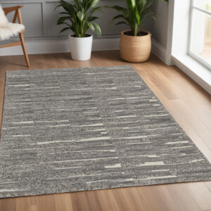 4' X 6' Gray Ivory and Taupe Abstract Hand Woven Area Rug