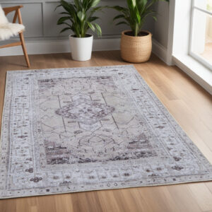 4' X 6' Gray Tan and Ivory Oriental Power Loom Worn Faded Washable Area Rug
