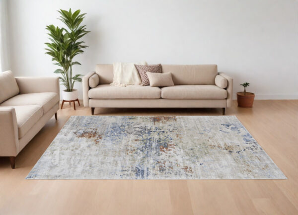 9' X 13' Red Blue and Ivory Abstract Power Loom Area Rug