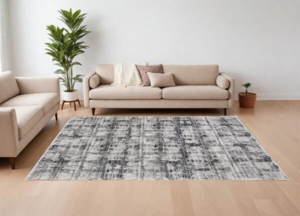 7' X 10' Gray and Ivory Abstract Power Loom Area Rug