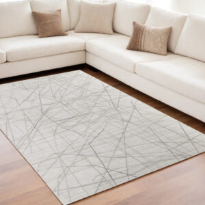 5' X 8' Gray and Ivory Abstract Hand Woven Area Rug