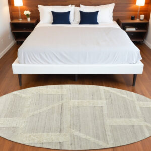 9' Gray and Ivory Wool Geometric Hand Woven Round Rug