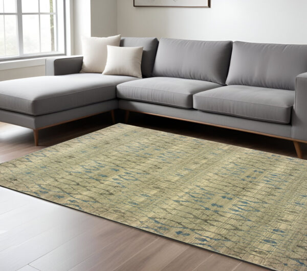 7' X 10' Blue And Ivory Geometric Distressed Area Rug