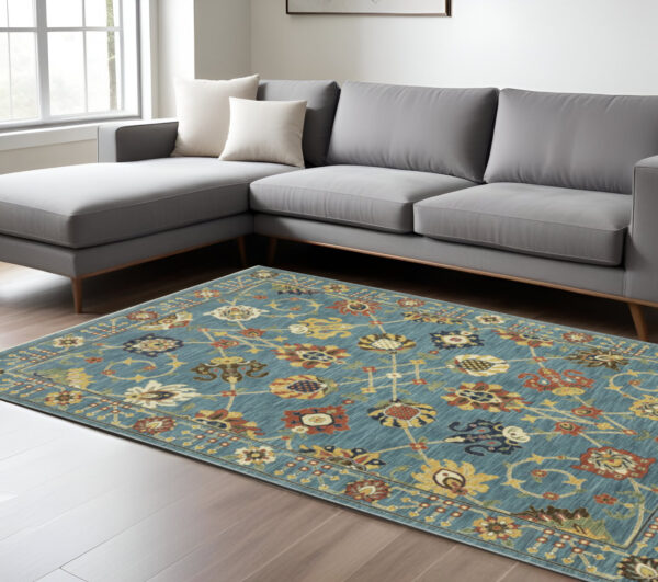 7' X 10' Blue Yellow And Ivory Oriental Area Rug With Fringe