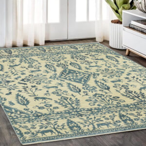 5' X 8' Ivory And Blue Oriental Area Rug With Fringe
