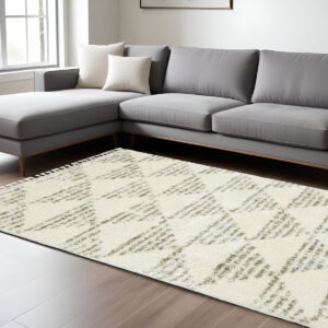 7' X 10' Ivory And Green Geometric Shag Area Rug With Fringe