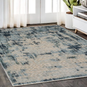 5' X 8' Beige And Blue Abstract Distressed Area Rug With Fringe
