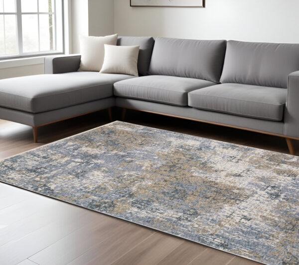 8' X 11' Beige And Blue Abstract Distressed Area Rug With Fringe