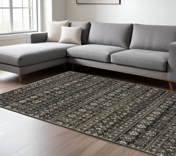 8' X 11' Black And Gray Tribal Area Rug With Fringe