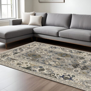 7' X 10' Ivory And Blue Oriental Area Rug With Fringe