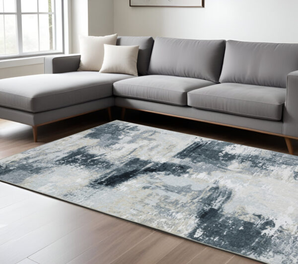 8' X 10' Ivory And Gray Abstract Distressed Area Rug