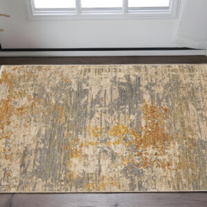 2' X 3' Beige And Gold Abstract Area Rug With Fringe