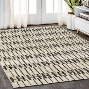 5' X 8' Beige And Black Geometric Area Rug