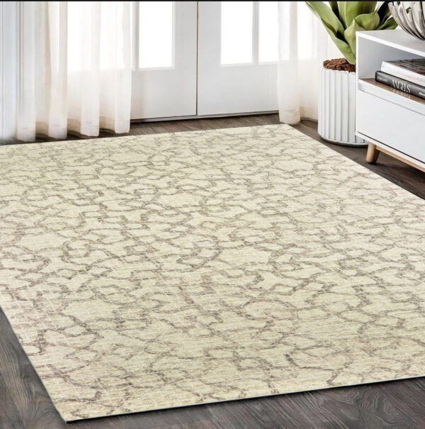 5' X 8' Tan And Ivory Wool Geometric Hand Tufted Area Rug